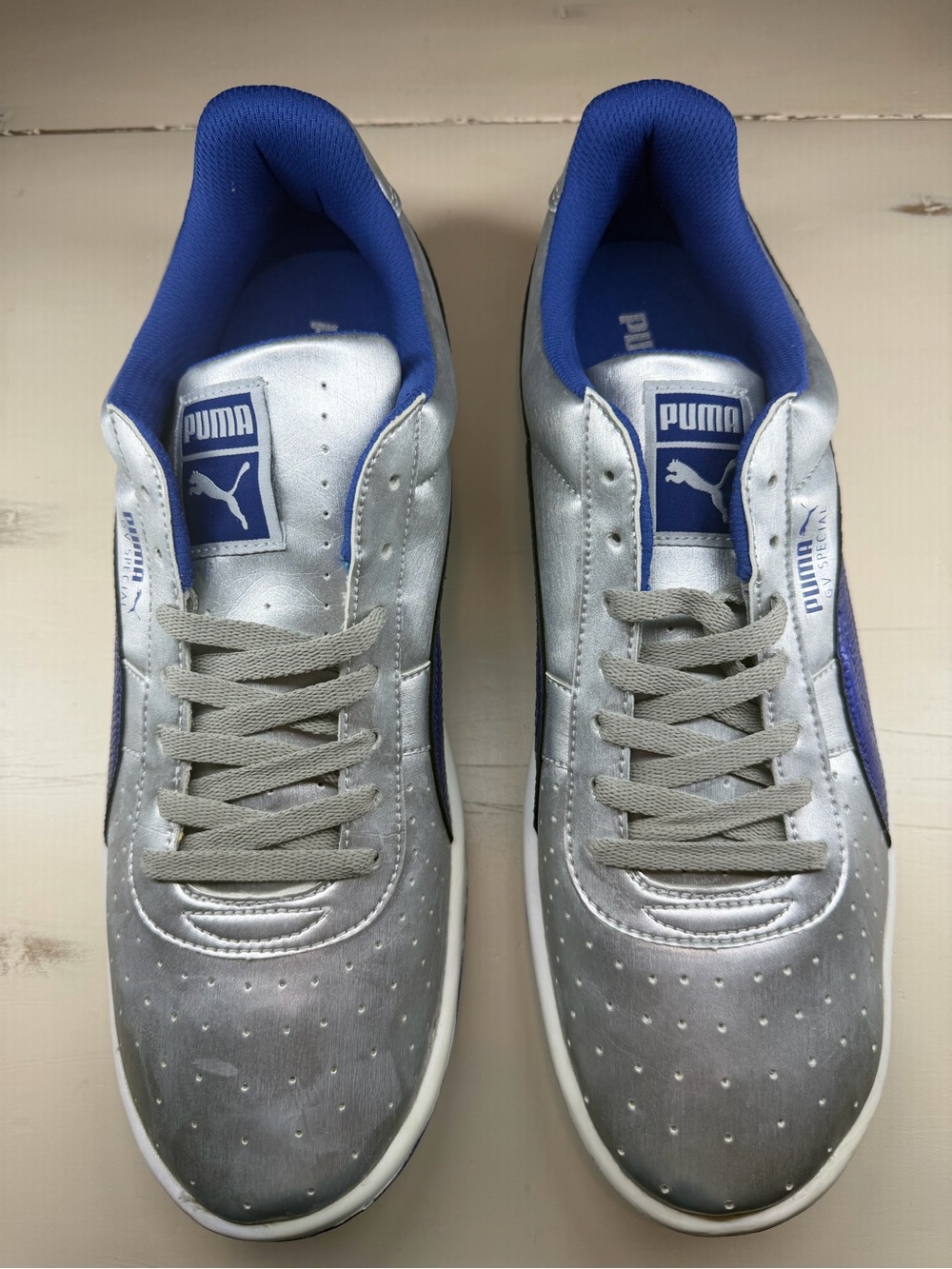 Puma Metallic Silver with Blue Accent Low-Top Sneakers. New w/o tags or box.